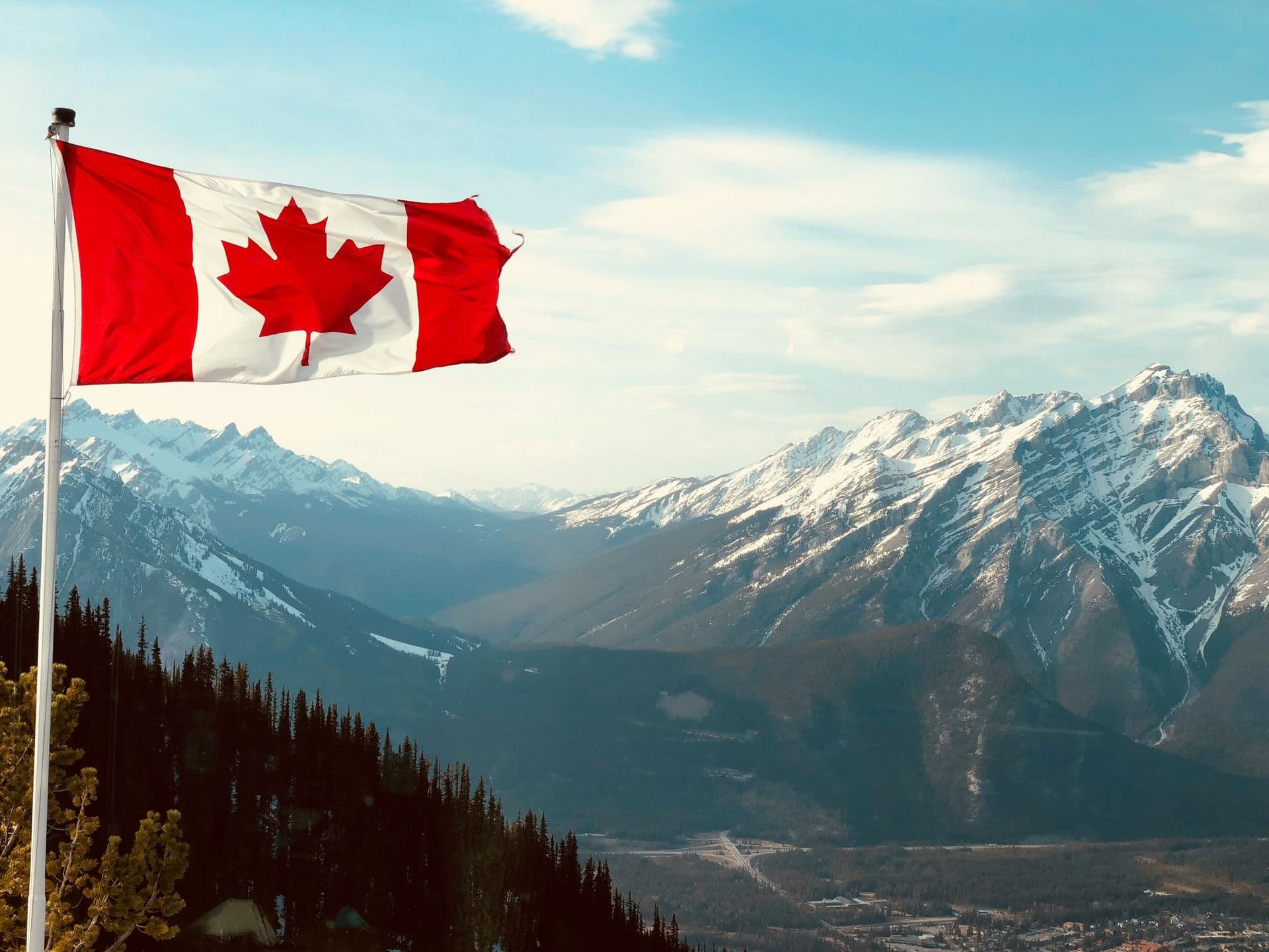 Canada flag and mountains