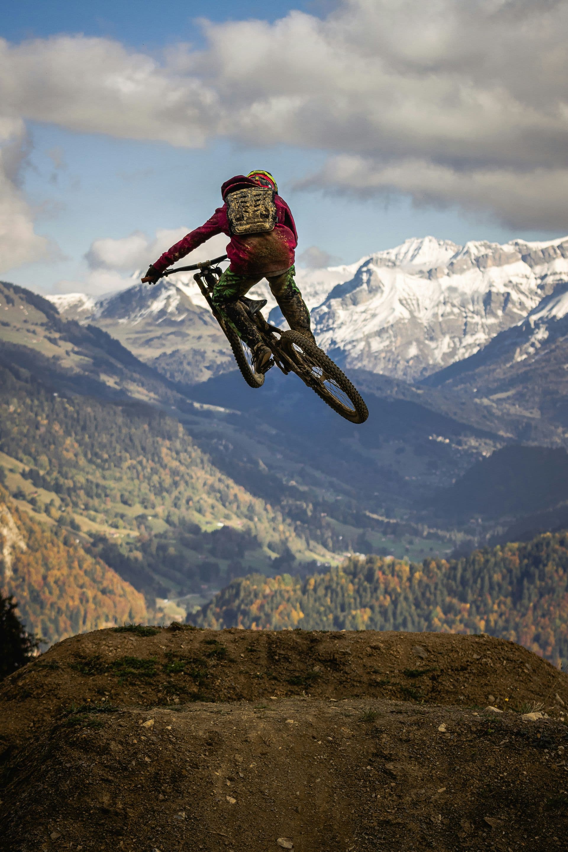 First responder riding a mountain bike on a forest trail